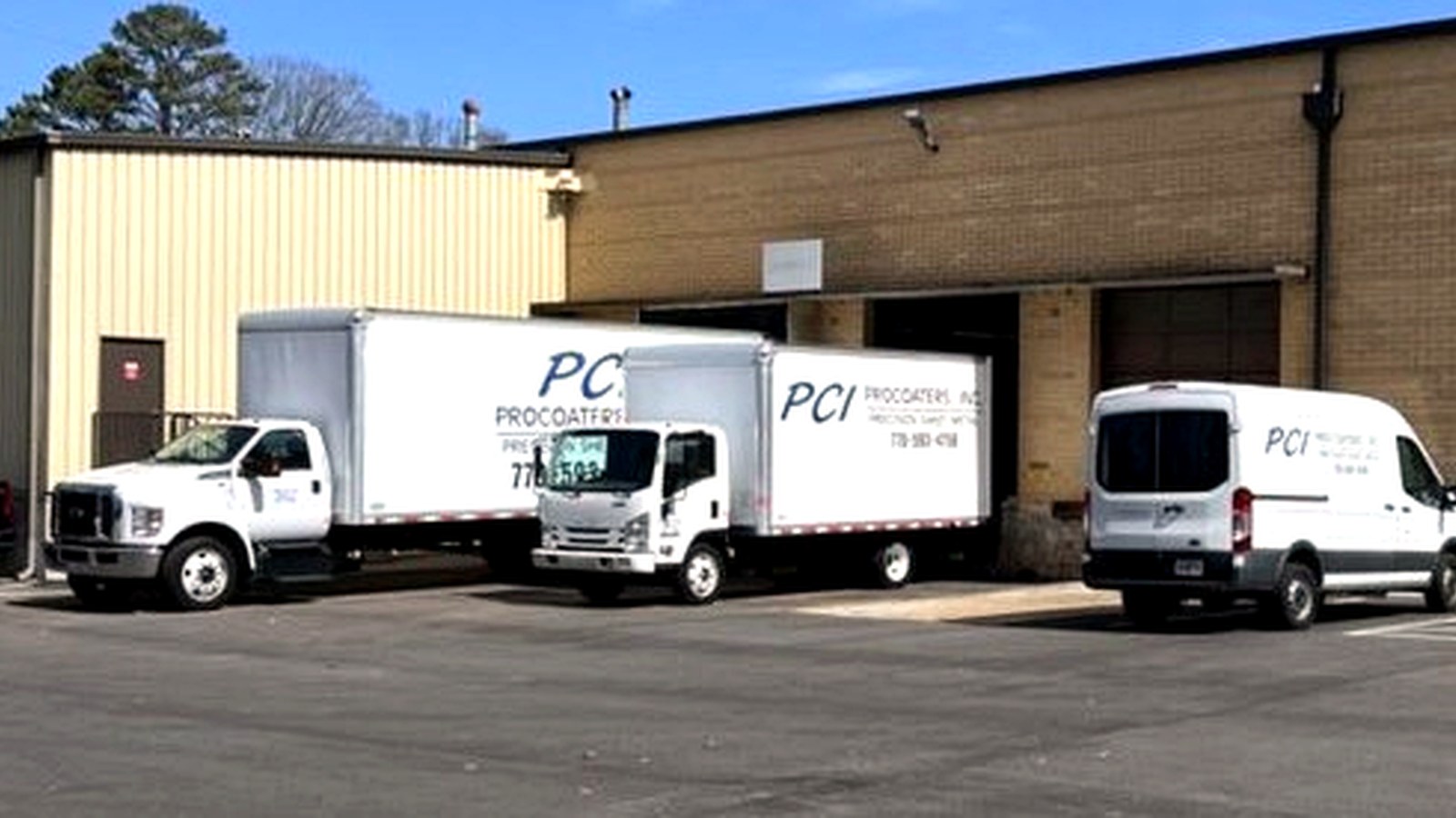packing and shipping station with cartons, foam, and palletized goods